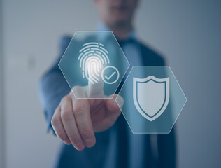 hand pushing a button on a touch screen. online authentication cyber security concept