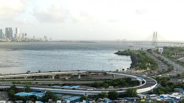 Panning shot from Bandra to Worli to Dadar and pull out to see the whole cityscape all during an evening time-lapse shot