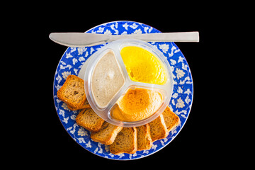 Slice of bread with fresh hummus dip