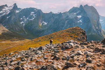 Hiking Brosmetinden mountain in Norway travel outdoor adventure vacations healthy lifestyle active...