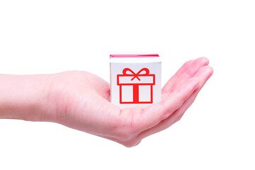 Tiny gift box in hand isolated on white