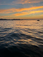 Fototapeta na wymiar Beautiful orange sunset at the sea, natural colors, seascape background
