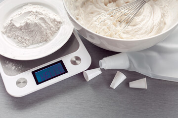kitchen weights measure the mass of flour for making biscuit