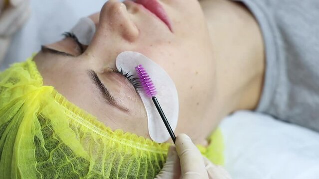 eyelash lamination process at the beautician close-up