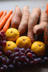 Various healthy autumnal food on wooden table. Selective focus.