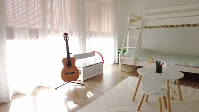 New modern children's room with bunk bed. New home. Interior photography. Wooden floor.