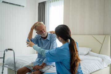 Nurses help do physical therapy for senior man in their home,Therapy physical rehab exercises.
