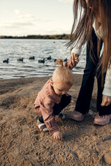 A mother and a son on the beach