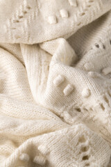 Fashionable knitted woolen cloth, warm soft textile close up view