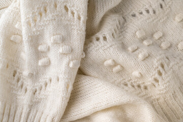 Fashionable knitted woolen cloth, warm soft textile close up view
