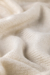 Fashionable knitted woolen cloth, warm soft textile close up view