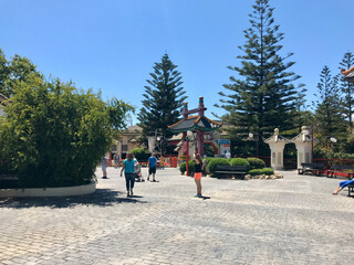 Salou, Spain, June 2019 - A group of people walking in the snow