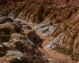 Landscape of multi-colored clay dunes. Mars on earth.
