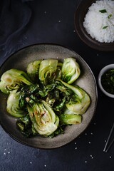 Asian Bok Choy stir fy with garlic and sesame seeds, selective focus