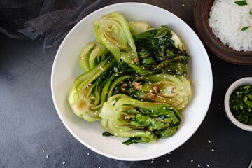 Asian Bok Choy stir fy with garlic and sesame seeds, selective focus