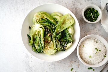Asian Bok Choy stir fy with garlic and sesame seeds, selective focus - obrazy, fototapety, plakaty