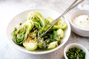 Asian Bok Choy stir fy with garlic and sesame seeds, selective focus