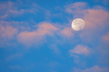 Naklejka na ściany i meble Blue sky with moon and clouds