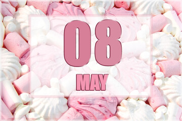 calendar date on the background of white and pink marshmallows. May 8 is the eighth day of the month