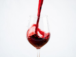 A glass of wine on a white background.