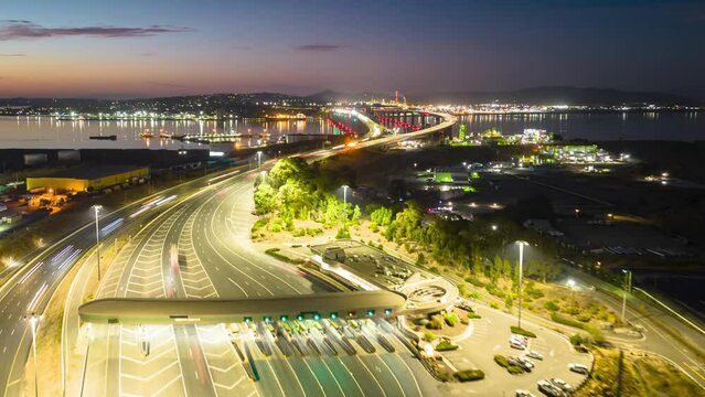 Hyperlapse of cars commuting through bridge toll over Benicia Martinez Bridge, California