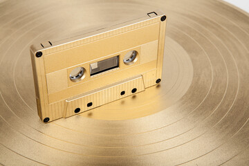 Vinyl record and cassette tape with recorded music