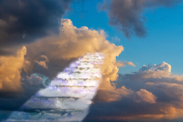 Beautiful religious background.Sunset or sunrise with clouds,stairs to heaven,bright light from...