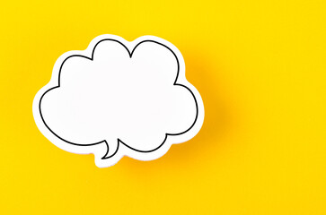 The Speech bubble with copy space communication talking speaking concepts on yellow color background.