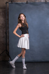 Fototapeta na wymiar Studio portrait of a young teen girl