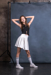 Fototapeta na wymiar Studio portrait of a young teen girl