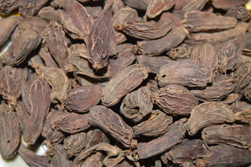 Black Cardamom Close-up View With Selective Focus Background. Indian Spice Background