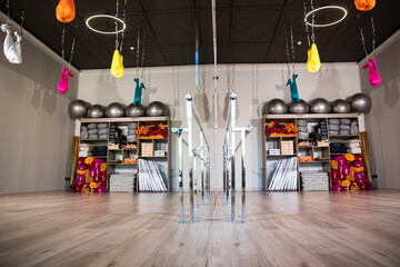 interior of the sports hall with hammocks for aero-yoga.