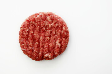 Raw fresh beef hamburger on a white background