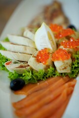 Delicious fish caviar canapes. Seafood in the diet. Decoration of the festive table.