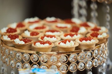 Delicious fish caviar canapes. Seafood in the diet. Decoration of the festive table.