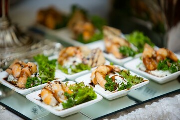 Seafood delicacy on the festive table. Snacks for guests at the event.