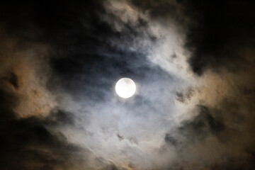 Naklejka na ściany i meble Full Moon in the night sky with clouds
