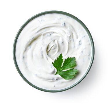 Green Bowl Of Sour Cream Dip Sauce With Herbs