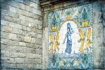 Medieval tile art decoration in the Gothic district in Barcelona, Spain