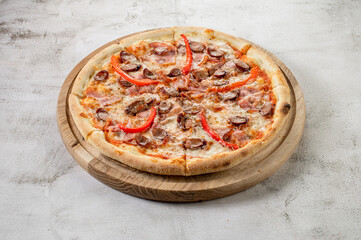 Fresh hot meat pizza on the white concrete background. Flat lay