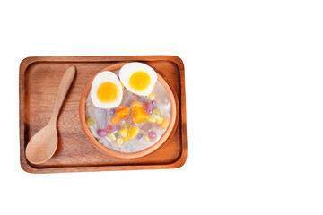 Thai desserts with coconut milk and small rolls and cooked eggs