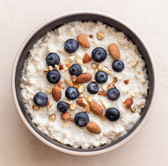 Oatmeal with blueberries, almonds and honey. Healthy food. Vegetarian food. Breakfast.