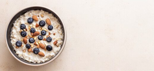 Oatmeal with blueberries, almonds and honey. Healthy food. Vegetarian food. Breakfast.