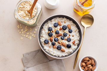 Oatmeal with blueberries, almonds and honey. Healthy food. Vegetarian food. Breakfast.