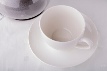 cup and saucer on the table