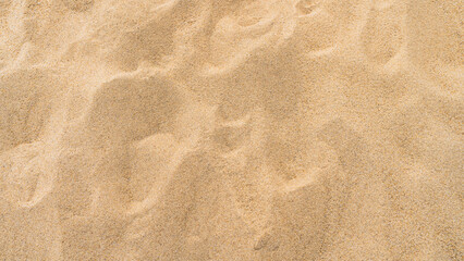 Fototapeta na wymiar Sand beach texture background top view