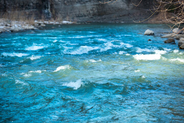 Blue river water with waves