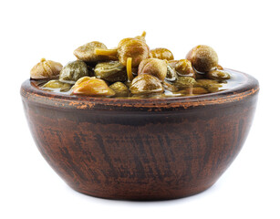 Clay bowl full of fragrant capers isolated on white background. Full clipping path.