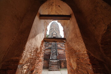 Ruins of pagodas and monks in Wat Khai Watthanaram, Ayutthaya, Thailand that were destroyed by...