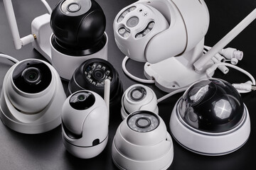 Surveillance cameras, set of different videcam, cctv cameras isolated on black background close up. home security system concept